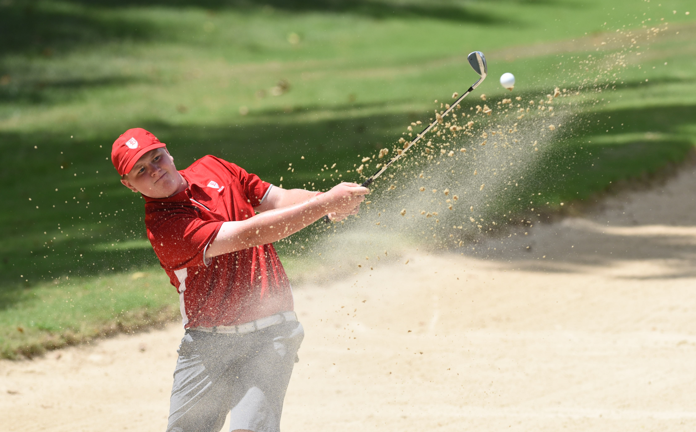 Baylor Sam Marshall blasts out of the no. 17 green side bunker at Black Creek on Tuesday, then finished with a two-day score of 146.