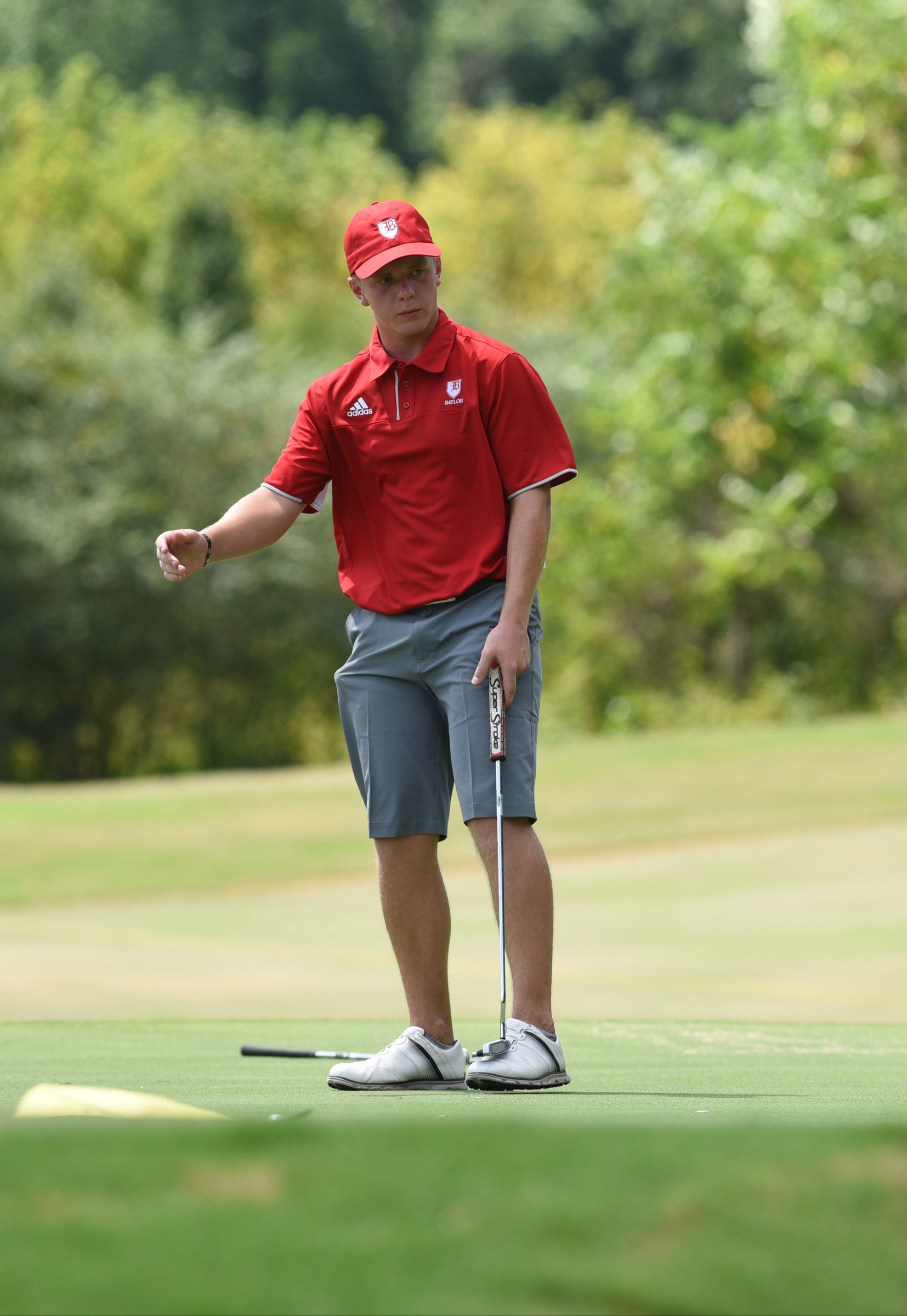 Baylor golfer A.J. Lintunen motions as his birdie putt misses on No. 15 Tuesday at Black Creek.