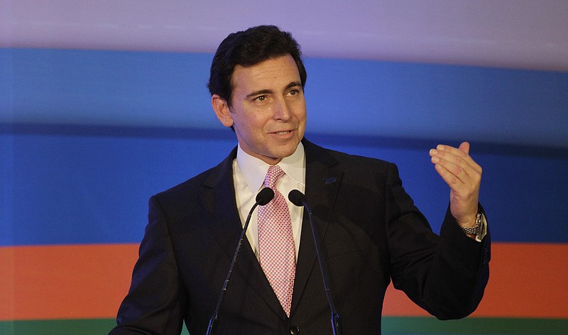 
              FILE - In this Thursday, March 26, 2015, file photo, Ford President and CEO Mark Fields speaks during the inauguration of Ford's manufacturing facility and engine plant at Sanand, near Ahmadabad, India. Fields said Tuesday, Aug. 16, 2016, that Ford Motor Co. will have a fully autonomous vehicle ready to provide ride-hailing or ride-sharing services by 2021. (AP Photo/Ajit Solanki, File)
            