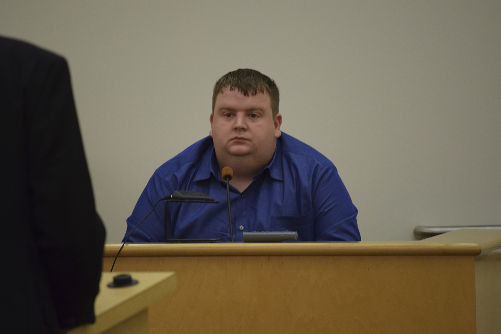 Christopher E. Russell, on trial in Marion County, Tenn., in the 2012 death of his infant son, takes the stand on Wednesday while the jury is out of the courtroom to discuss his decision on testifying on his own behalf. Russell decided not to testify, exercising his Fifth Amendment rights.
