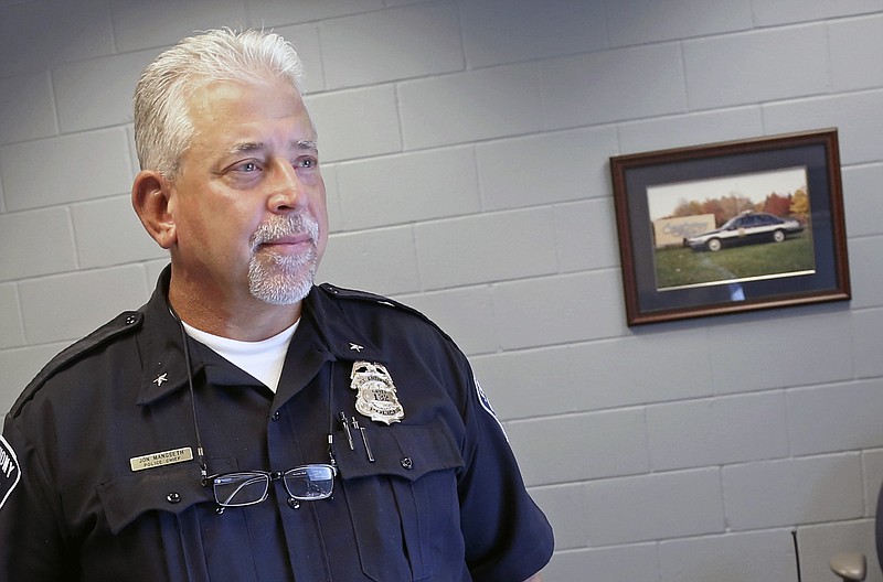 
              St. Anthony police chief Jon Mangseth poses for a photo Wednesday, Aug. 17, 2016, in St. Anthony, Minn. The chief of the suburban St. Paul police department whose officer shot and killed a black man during a July traffic stop is ready to defend his employee. Mangseth's interview with The Associated Press Wednesday marks his first public comments on the July 6 shooting of Philando Castile since the incident made St. Anthony's police department one of the latest to confront an officer-involved shooting of a black man. (AP Photo/Jim Mone)
            