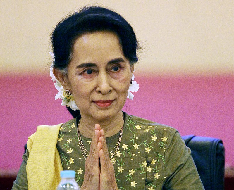 
              FILE - In this July 29, 2016, file photo, Myanmar's Foreign Minister Aung San Suu Kyi greets leaders of armed ethnic groups during their meeting at a hotel in Naypyitaw, Myanmar. Suu Kyi on Wednesday, Aug. 17, 2016, began a formal five-day visit to China to bolster ties with her country's dominant northern neighbor. It's her first trip to China since her party won a historic majority in 2015. (AP Photo/Aung Shine Oo, File)
            
