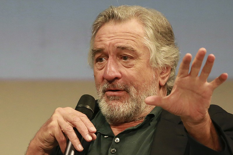 
              FILE - In this file photo dated Saturday, Aug. 13, 2016, actor Robert De Niro addresses journalist in Sarajevo, Bosnia, during the 22nd Sarajevo Film Festival.  Robert De Niro and a hotel group have won planning permission for a luxury hotel in central London's Covent Garden area, after Westminster Council approved plans Tuesday Aug. 16, 2016, for the 83-room Wellington Hotel. (AP Photo, FILE)
            