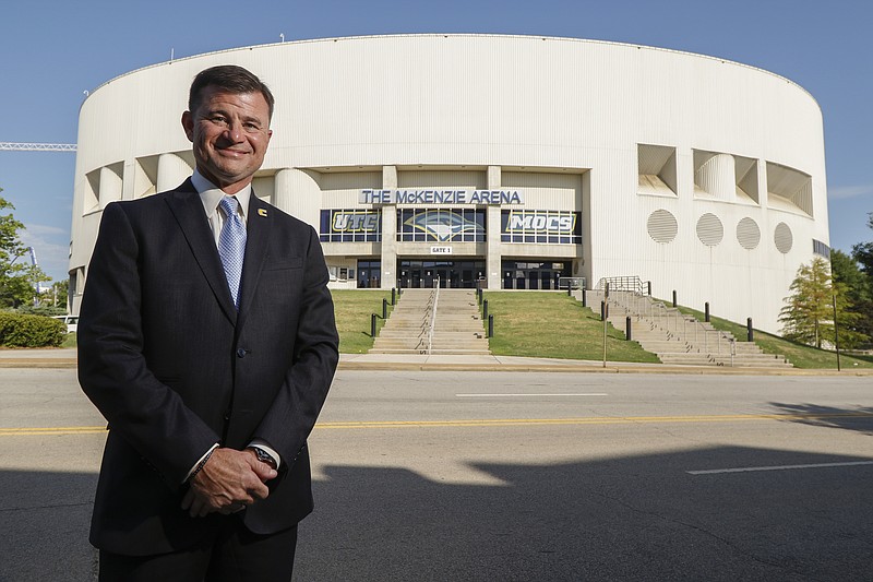 David Blackburn, Vice Chancellor and Director of Athletics for The University of Tennessee at Chattanooga, stands in front of McKenzie Arena where his office is located.