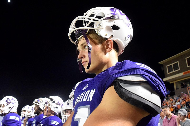 Marion County's Alex Kirdendoll (17) watches from the sidelines.  The Sequatchie Valley Football Jamboree was held at South Pittsburg High School on Friday August, 12, 2016. 