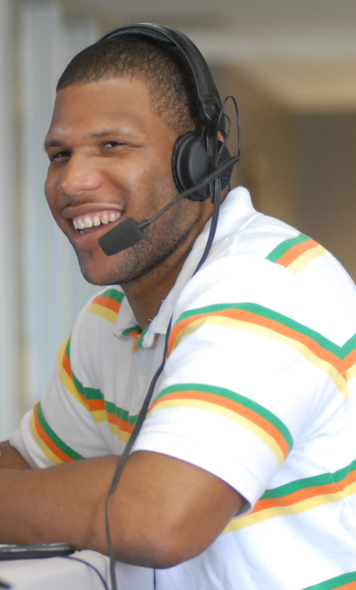 Gerald Riggs co-hosts SportTalk, a local sports show on WGOW-FM, during an on-location broadcast at Kelly Auto Group on Thursday. Mr. Riggs is a former football player from Red Bank High School who went on to play for the University of Tennessee.