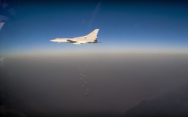 
              In this frame grab provided by Russian Defence Ministry press service Russian long range bomber Tu-22M3 flies during an air strike over Syria on Thursday, Aug. 18, 2016. Russia's Defence Ministry said on Tuesday Russian warplanes have taken off from a base in Iran and in Russia to target Islamic State fighters in Syria. (Russian Defence Ministry Press Service photo via AP)
            