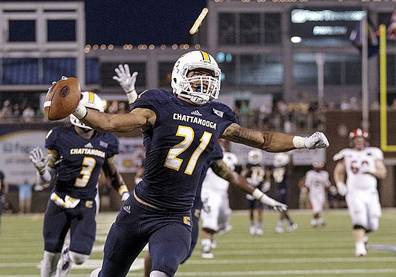 UTC defensive back Montrell Pardue celebrates after stripping the ball and running it for a touchdown during the Mocs' season-opener football game against Jacksonville State at Finley Stadium on Saturday, Sept. 5, 2015, in Chattanooga, Tenn.