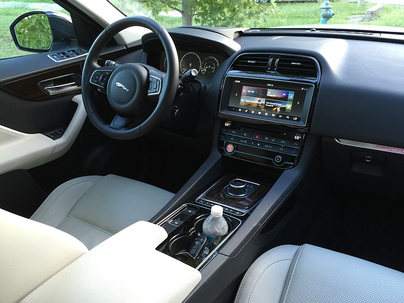 The two-tone color scheme of the 2017 Jaguar F-Pace lends visual interest to the interior.
