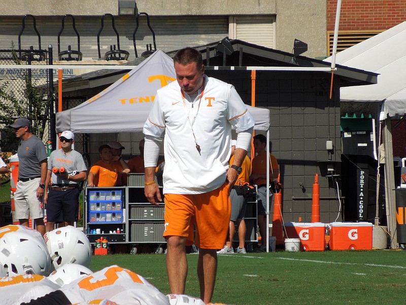 Tennessee head coach Butch Jones watches his team practice at Haslam Field on Aug. 18, 2016.