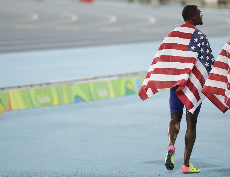 
              United States' Justin Gatlin celebrates after the men's 4x100-meter relay final during the athletics competitions of the 2016 Summer Olympics at the Olympic stadium in Rio de Janeiro, Brazil, Friday, Aug. 19, 2016. (AP Photo/David Goldman)
            