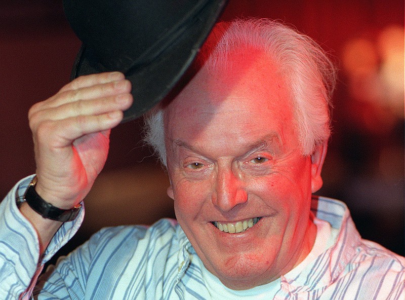 
              FILE  - In this Dec. 7, 1998 file photo, actor and learning disability campaigner Brian Rix, 92 poses for the camera, in London. A British charity says Brian Rix, a comic actor who used his fame to draw attention to the struggles of people with learning disabilities, has died it was announced on Saturday, Aug. 20, 2016. He was 92 and had been ill for some time. (Abbie Trayler Smith/PA via AP, File)
            