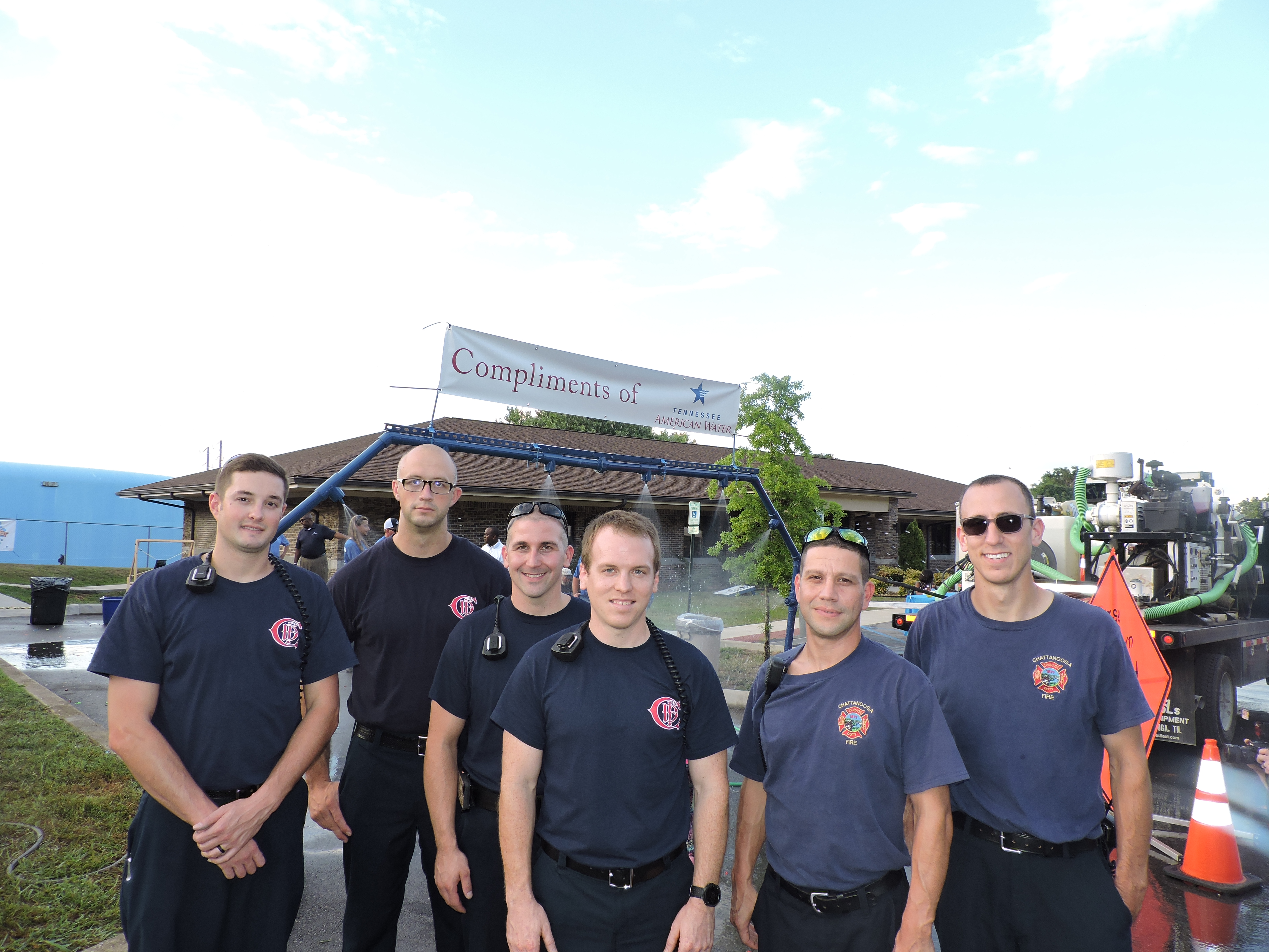 From left, Chattanooga firefighters Brandon Atkins, Matthew Enyart, Daniel Cholota, Cullom Boyd, Joel Bustos and Lt. James Guerrieri pose for a photo. Guerrieri said the day offered a chance to educate the community on things like grass and house fire dangers — and show off the department's 2001 model Quint ladder truck to attending children.