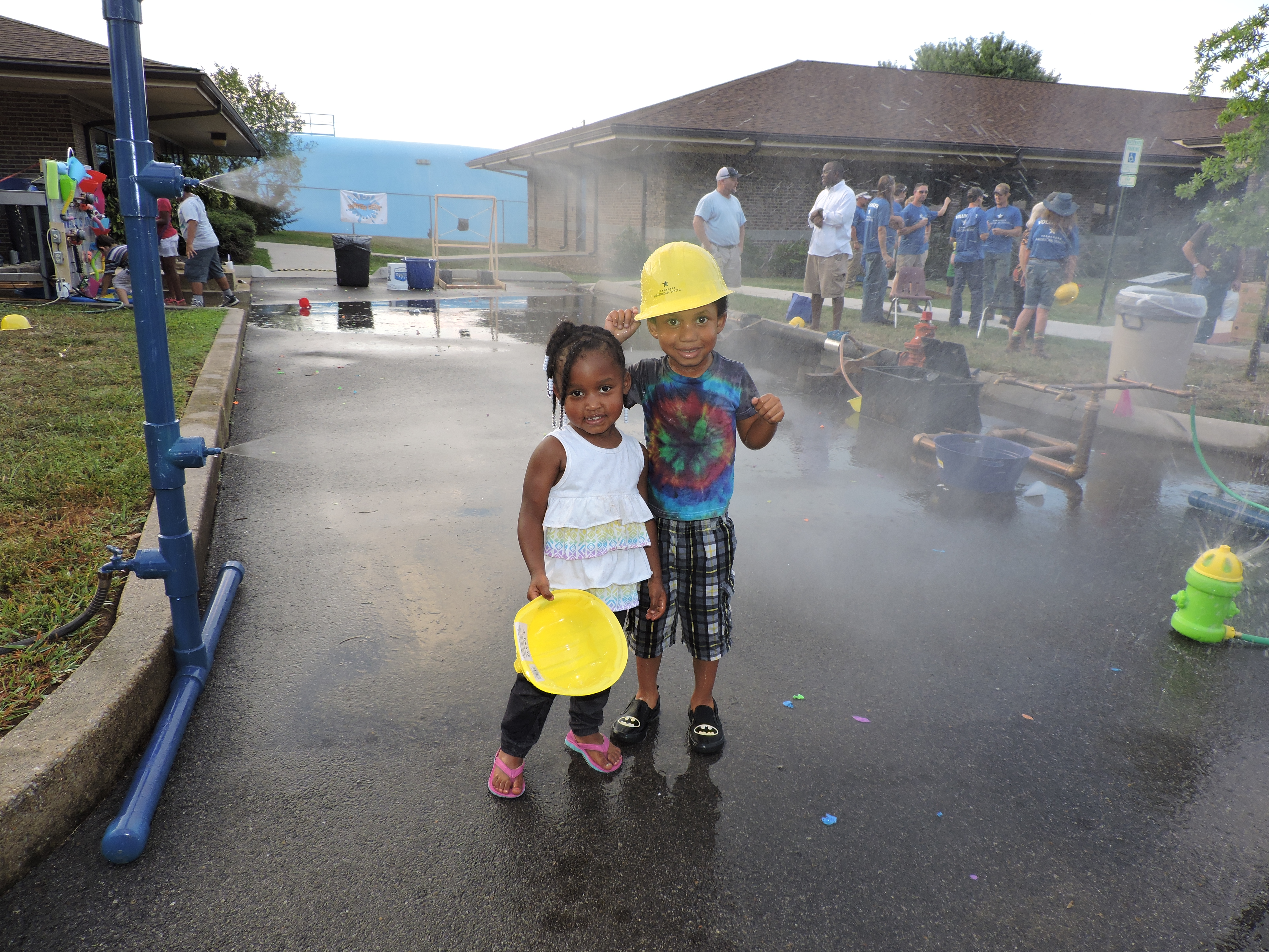 North Shore residents Khloe, 2, and Kenyon, 4, enjoy playing in the water at Water Fest.