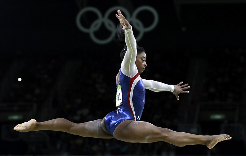 Simone Biles of the United States performs on the balance beam during the artistic gymnastics women's individual all-around final at the 2016 Summer Olympics in Rio de Janeiro.