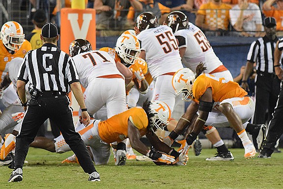 Jalen Reeves-Maybin (21) recovers a Bowling Green fumble in the fourth quarter.  The Tennessee Volunteers hosted the Bowling Green Falcons at Nissan Stadium in Nashville September 5, 2015.