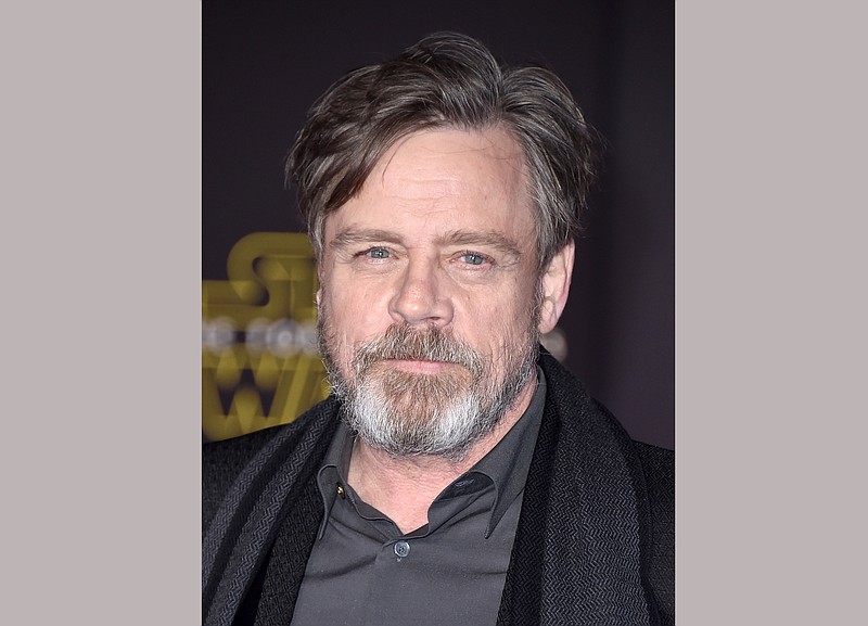 
              FILE - In this Dec. 14, 2015 file photo, Mark Hamill arrives at the world premiere of "Star Wars: The Force Awakens" in Los Angeles. Hamill is lending his support to a terminally ill fan who wants to see "Rogue One: A Star Wars Story" before he dies. Illustrator Neil Hanvey from Oldham, England, was informed by doctors in April that he has six to eight months to live. "Rogue One" is set for release Dec. 16. (Photo by Jordan Strauss/Invision/AP, File)
            