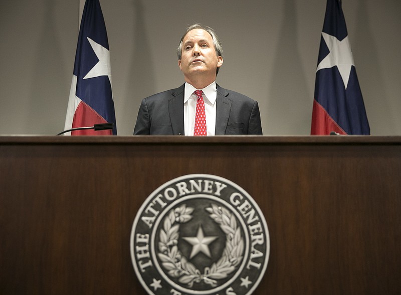 
              FILE - In this May 25, 2016, file photo, Republican Texas Attorney General Ken Paxton announces Texas' lawsuit to challenge President Obama's transgender bathroom order during a news conference in Austin, Texas. A federal judge in Texas is blocking for now the Obama administration's directive to U.S. public schools that transgender students must be allowed to use the bathrooms and locker rooms consistent with their chosen gender identity. Paxton had argued that halting the law before school began was necessary because districts risked losing federal education dollars if they didn't comply. (Jay Janner/Austin American-Statesman via AP)
            