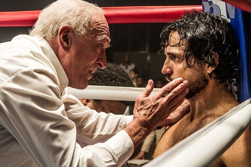 This image released by The Weinstein Company shows Robert De Niro, left, and Edgar Ramirez in a scene from, "Hands of Stone." (Rico Torres/The Weinstein Company via AP)