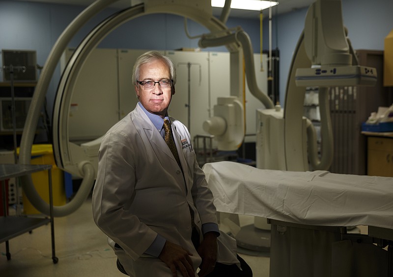 Dr. Thomas Devlin is photographed in a neurology procedure room at Erlanger Hospital on Tuesday, Aug. 23, 2016, in Chattanooga, Tenn. Dr. Devlin is a leader in a clinical trial involving injecting stem cells into the brains of stroke victims.