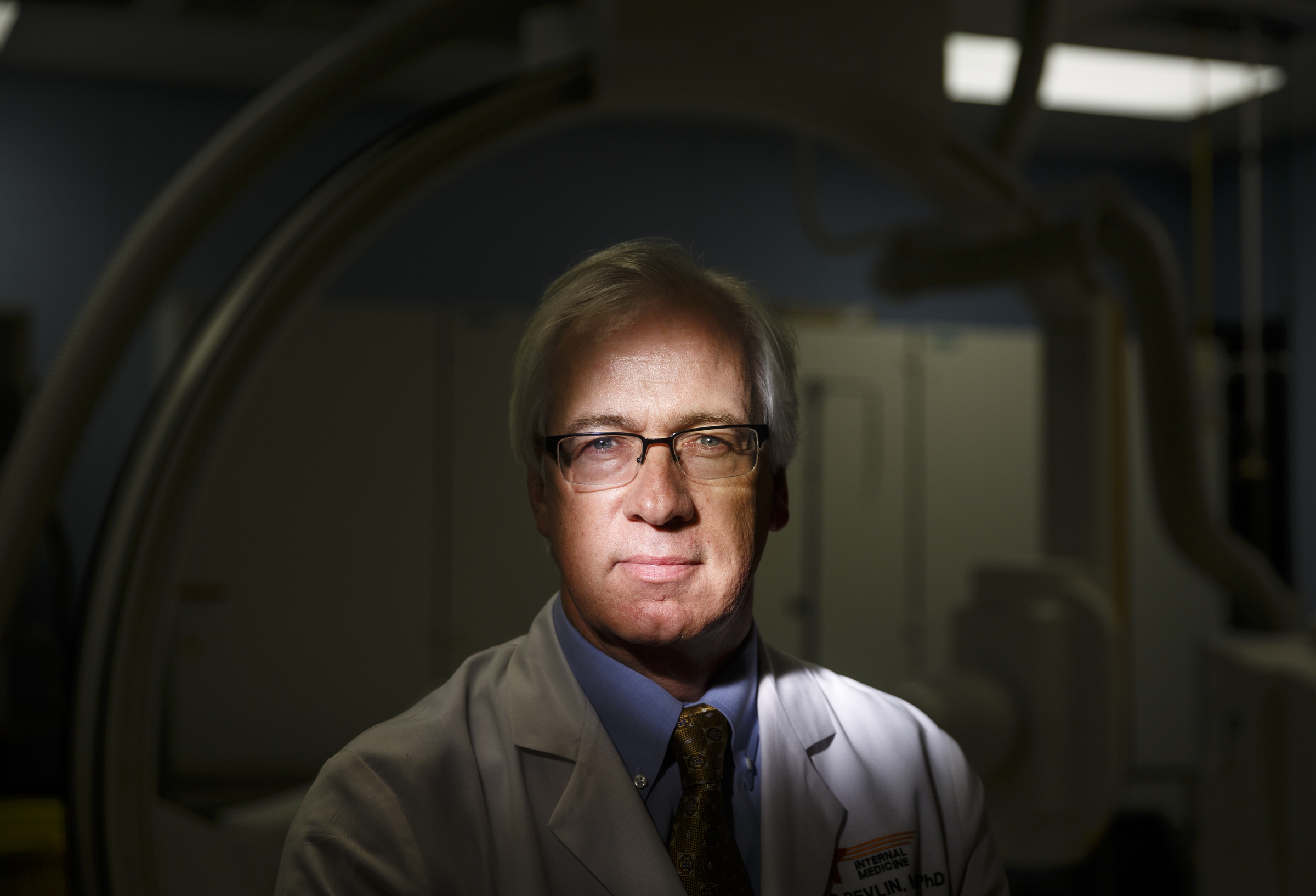 Dr. Thomas Devlin is photographed in a neurology procedure room at Erlanger Hospital on Tuesday, Aug. 23, 2016, in Chattanooga, Tenn. Dr. Devlin is a leader in a clinical trial involving injecting stem cells into the brains of stroke victims.