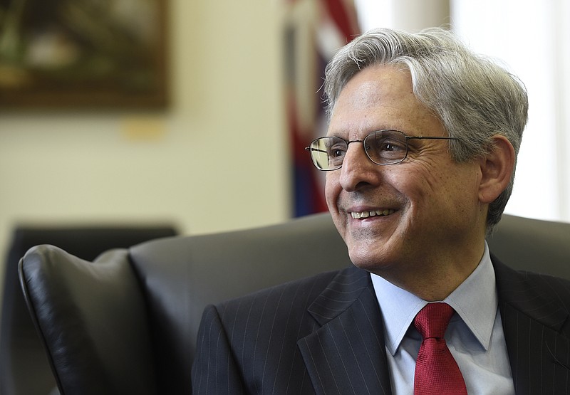 
              FILE - In this May 10, 2016 file photo, Supreme Court nominee Merrick Garland meets with Sen. Brian Schatz, D-Hawaii, on Capitol Hill in Washington. While Democrats are pushing Republican Majority Leader Mitch McConnell to confirm Supreme Court nominee Merrick Garland by the end of President Barack Obama’s term, McConnell has been resolute in blocking him, saying the next president should make the pick. Republicans say it’s a winning strategy in a year when some of the GOP rank and file are struggling with reasons to vote for their nominee.  (AP Photo/Susan Walsh, File)
            