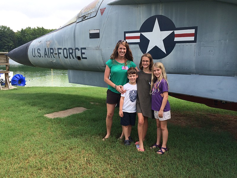 Signal Mountain resident Ava Sabatini is picked up by her family following a weeklong Mach I Aviation Challenge at the U.S. Space & Rocket Center in Huntsville, Ala. From left are Lauren, Elijah, Ava and Mia Sabatini.