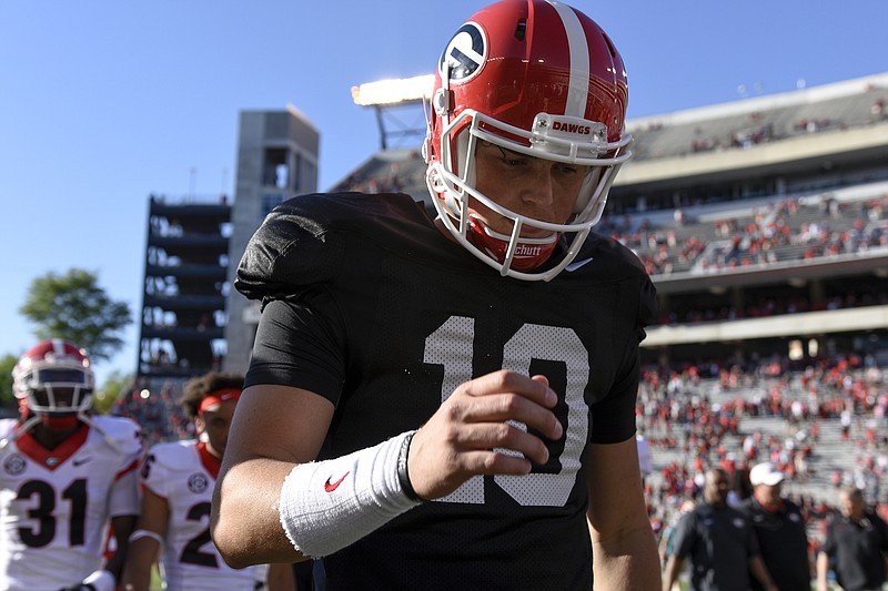 Freshman Jacob Eason remains in the hunt to be Georgia's starting quarterback in next week's opener against North Carolina in the Chick-fil-A Kickoff Classic.