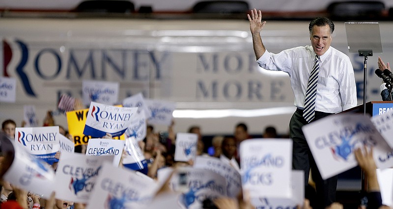 
              FILE -In this Nov. 4, 2012 file photo, then-Republican presidential candidate, former Massachusetts Gov. Mitt Romney steps on stage to speak at a campaign event  in Cleveland. When President Barack Obama ran for re-election, Democrats made no secret of their disdain for Mitt Romney. That was all before Donald Trump.
Horrified by the prospect of Trump in the White House, Obama and his party have changed their tune about Romney. As they denounce Trump as “unhinged” and unfit, they’re getting nostalgic about the 2012 Republican nominee they now describe as principled, competent and honorable. (AP Photo/David Goldman, File)
            