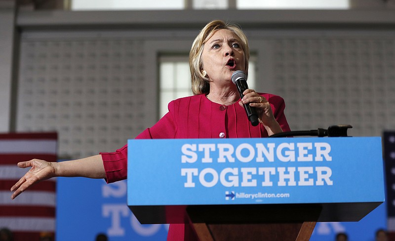In this Aug. 16, 2016 file photo, Democratic presidential candidate Hillary Clinton speaks in Philadelphia. More than half the people outside the government who met with Hillary Clinton while she was secretary of state gave money, either personally or through companies or groups, to the Clinton Foundation. It's an extraordinary proportion indicating her possible ethics challenges if elected president. (AP Photo/Carolyn Kaster, File)