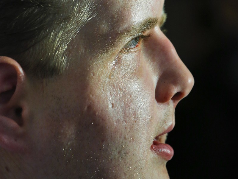 
              Former Mississippi firefighter Patrick Hardison, 42, gets teary-eye under television lights, during a press conference marking one year after his face transplant, Wednesday Aug. 24, 2016, at New York University Langone Medical Center in New York. Hardison, who has light-sensitive eyes as his new face continues to thrive, was disfigured while trying to save people from a house fire in 2001 and received the face of a Brooklyn cyclist who died in an accident in July 2015-- a surgery successfully perform by a team of doctors at NYU Langone. (AP Photo/Bebeto Matthews)
            