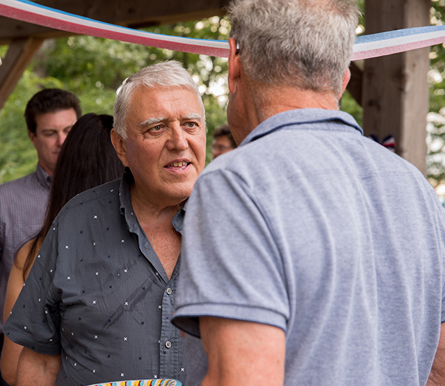Eric Kruger talks with Frank Brock.