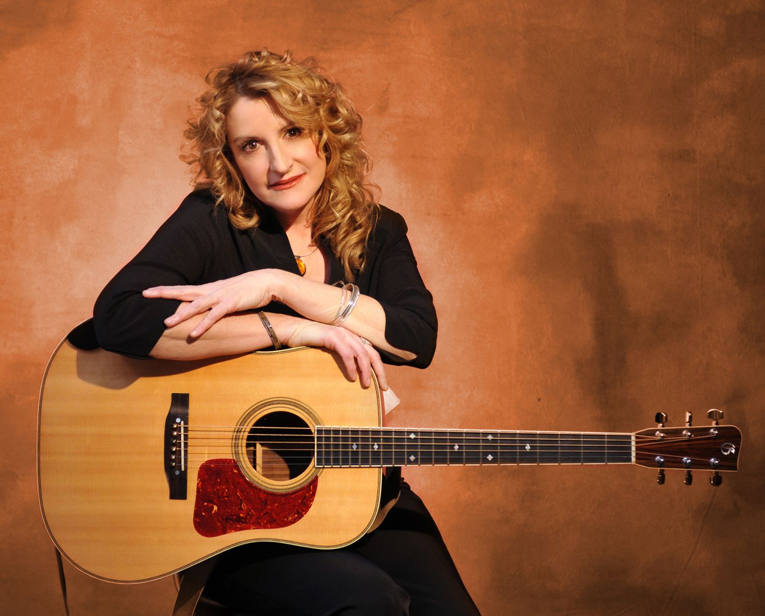 Considered one of the best female vocalists in bluegrass, Claire Lynch is taking the Barking Legs Theater stage on Friday 9/9, a week before her new album North By South is released.
