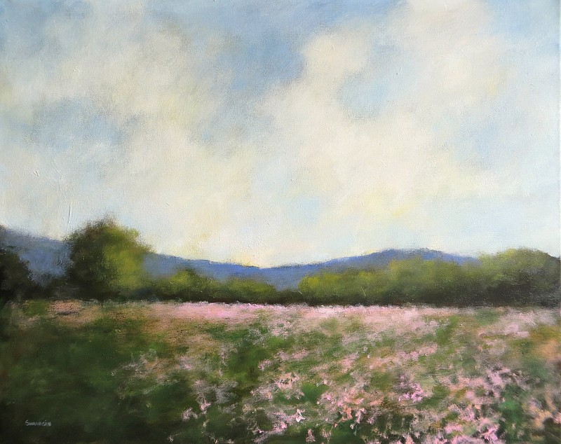 David Swanagin is known for his landscapes with vast, luminous skies. He will be showcased in a September exhibit along with Lissa Hunter. Here, he depicts fields of lavender in full bloom.