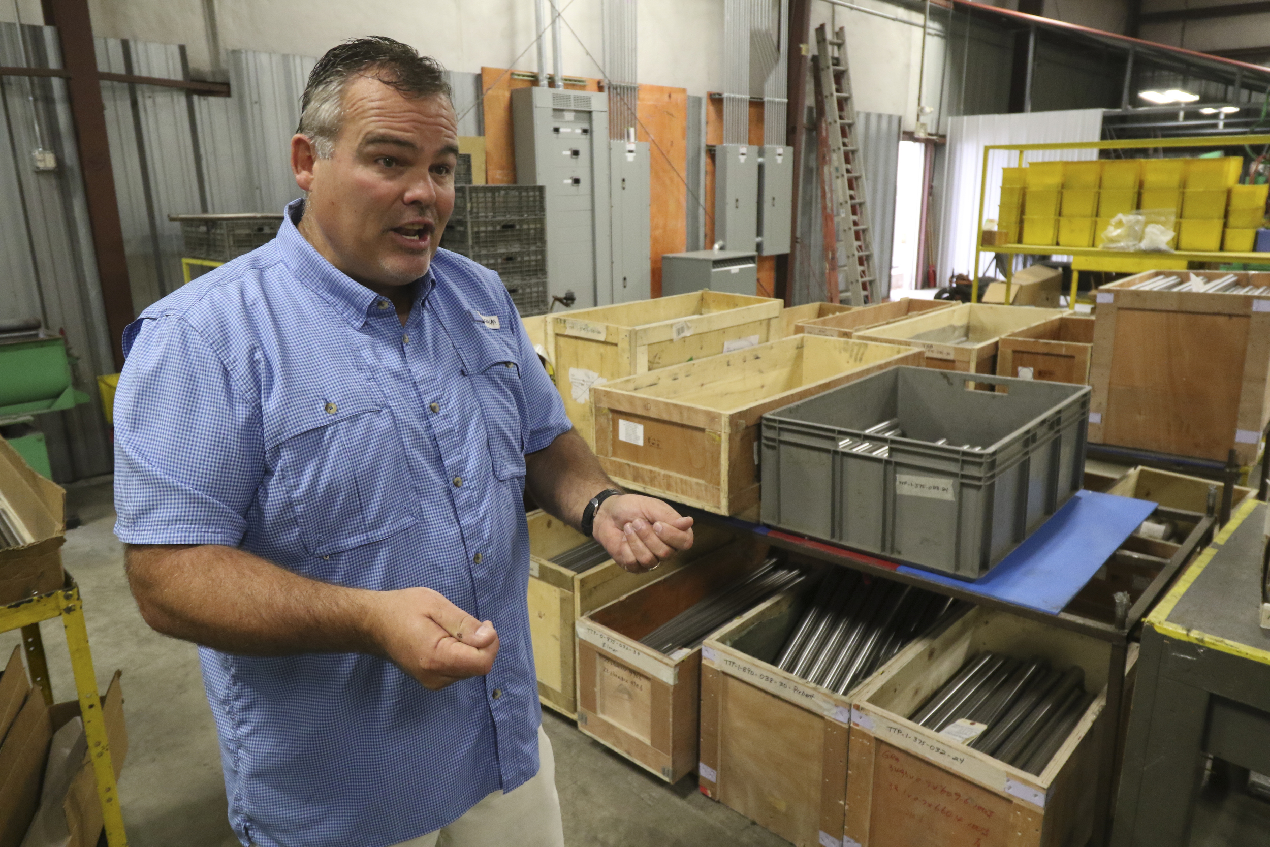 Staff Photo by Dan Henry / The Chattanooga Times Free Press- 8/18/16. Marcus Higgins explains how titanium bikes are made while at American Bicycle Group's new Amnicola Highway location on Thursday, August 18, 2016.