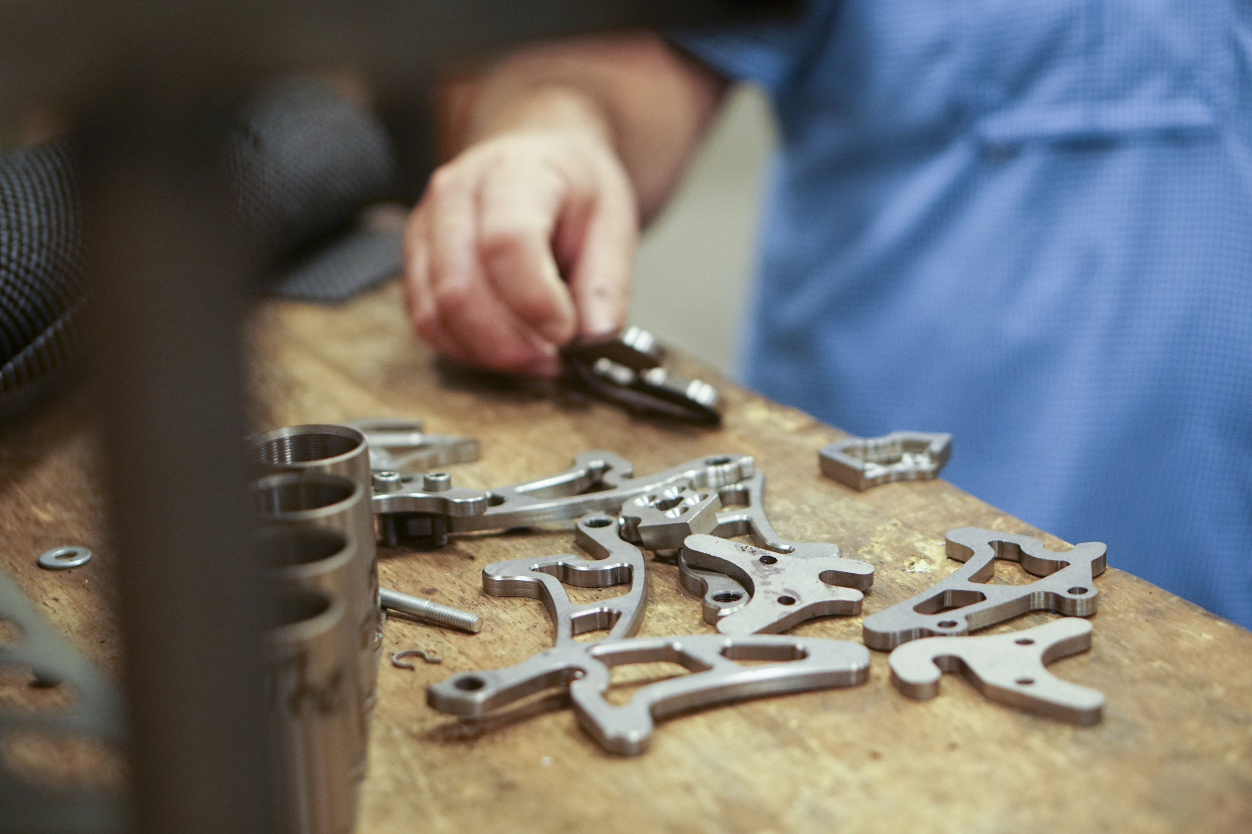 Staff Photo by Dan Henry / The Chattanooga Times Free Press- 8/18/16. Custom CNC machined parts are laid out to be used at American Bicycle Group's new Amnicola Highway location on Thursday, August 18, 2016.
