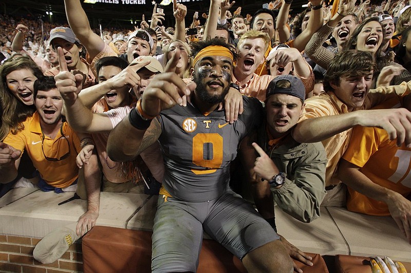 Tennessee defensive end Derek Barnett celebrates with fans after the Vols' comeback win against Georgia last October in Knoxville. Barnett is back for his junior season and expected to be a major contributor again before likely entering the NFL draft.