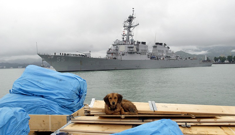 
              FILE - In this July 14, 2009 file photo, the U.S. guided missile destroyer USS Stout enters Georgia's Black Sea port of Batumi. A U.S. Navy ship fired three warning shots in the direction of an Iranian boat that was approaching another American ship head-on in the North Arabian Gulf on Wednesday, U.S. officials said, in an escalation of encounters in the region this week.  (AP Photo/ Shakh Aivazov, File)
            