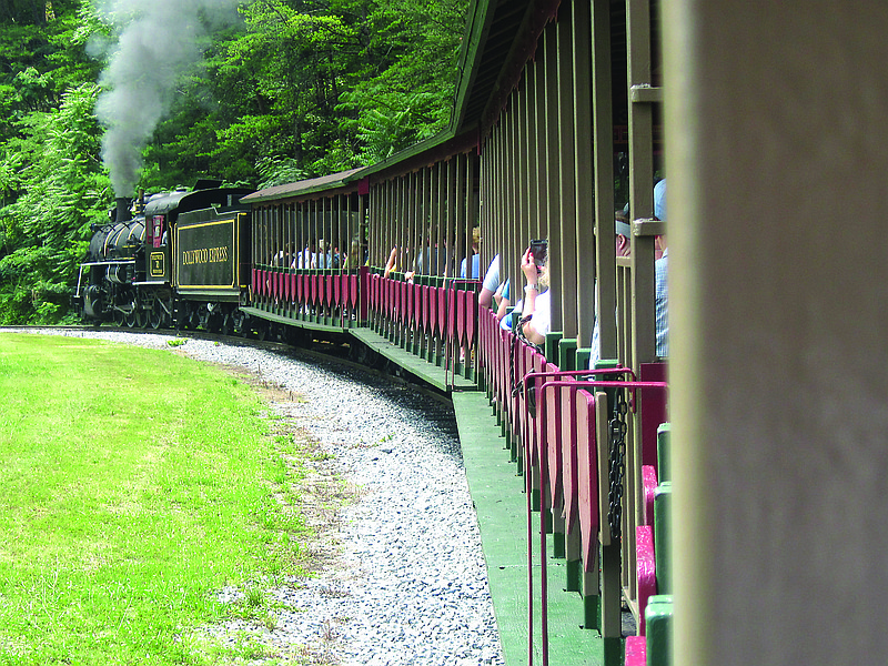 Jun 25, 2012 - Visitors ride the Dollywood Express steam train at the Dollywood theme park in Pigeon Forge, Tenn. 