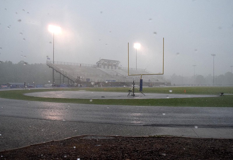 Heavy rains obscure Benny Monroe Stadium at Cleveland High School.  The game was delayed for over a hour.  The East Hamilton Hurricanes visited the Cleveland Blue Raiders in TSSAA football action on August, 26, 2016. 