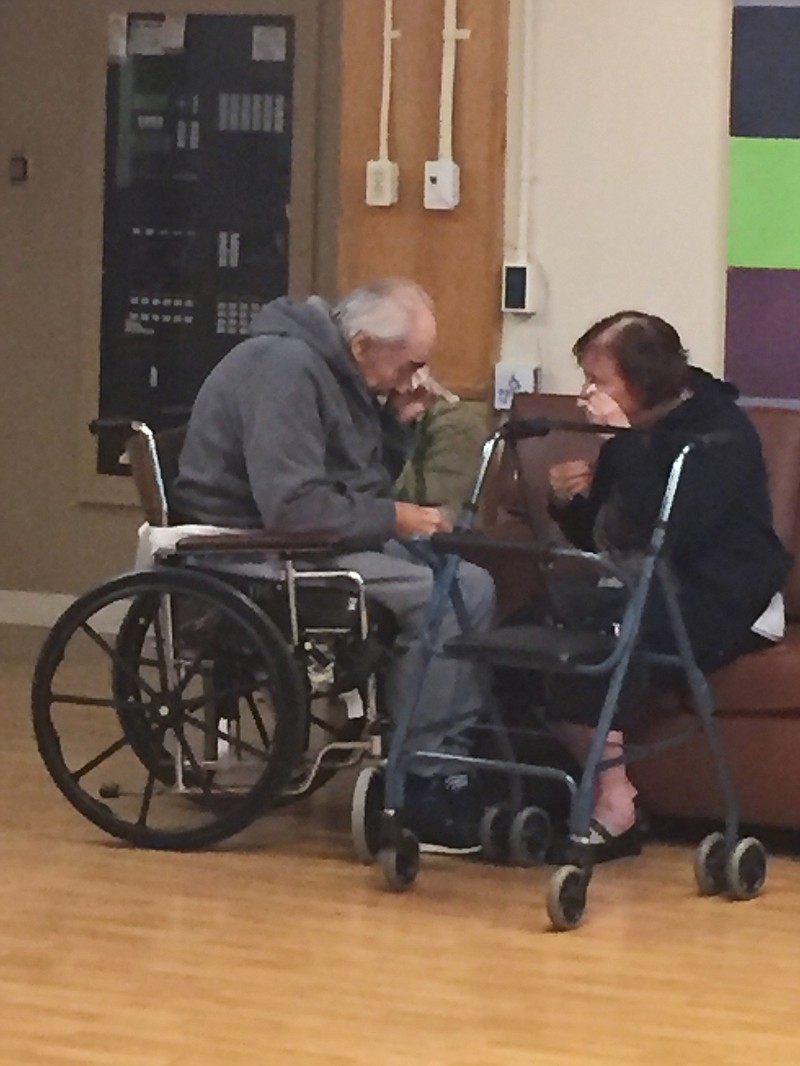 
              In this Monday, Aug. 22, 2016 photo provided by Ashley Bartyik, her grandparents Wolfram and Anita Gottschalk of Surrey, British Columbia, Canada, cry as they say goodbye near the end of a visit with each other in Wolfram's elderly care home in Surrey. The couple, who are in their 80s, were separated into two different care homes a half an hour apart after 62 years of marriage because no beds were available together. (Ashley Bartyik via AP)
            