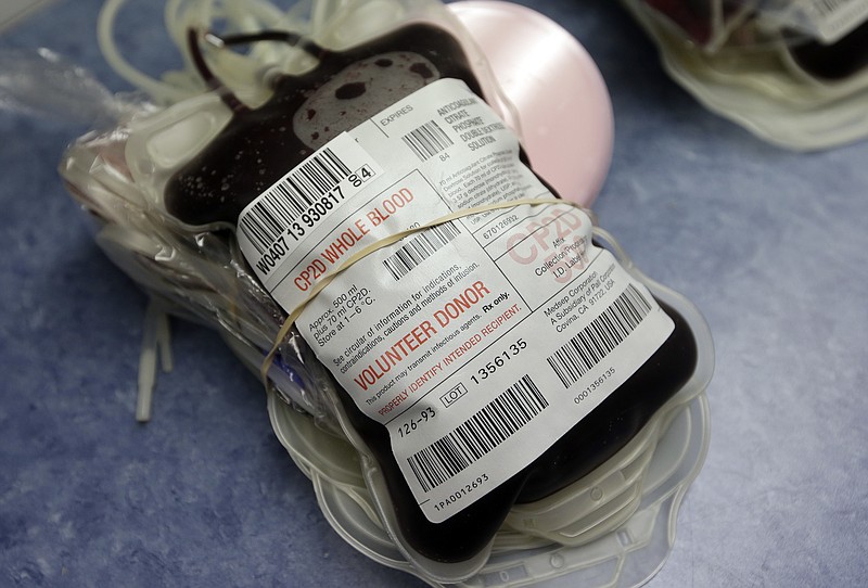This Aug. 20, 2013 file photo shows blood donated in Indianapolis. On Friday, Aug. 26, 2016, the Food and Drug Administration recommended that all U.S. blood banks start screening for the Zika virus, a major expansion intended to protect the nation's blood supply from the mosquito-borne disease. (AP Photo/Michael Conroy)