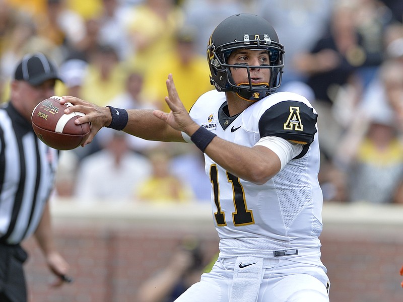 Appalachian State quarterback Taylor Lamb throws a pass during the first half of an NCAA college football game against Clemson Saturday,  Sept. 12, 2015,  in Clemson, S.C. (AP Photo/Richard Shiro)
