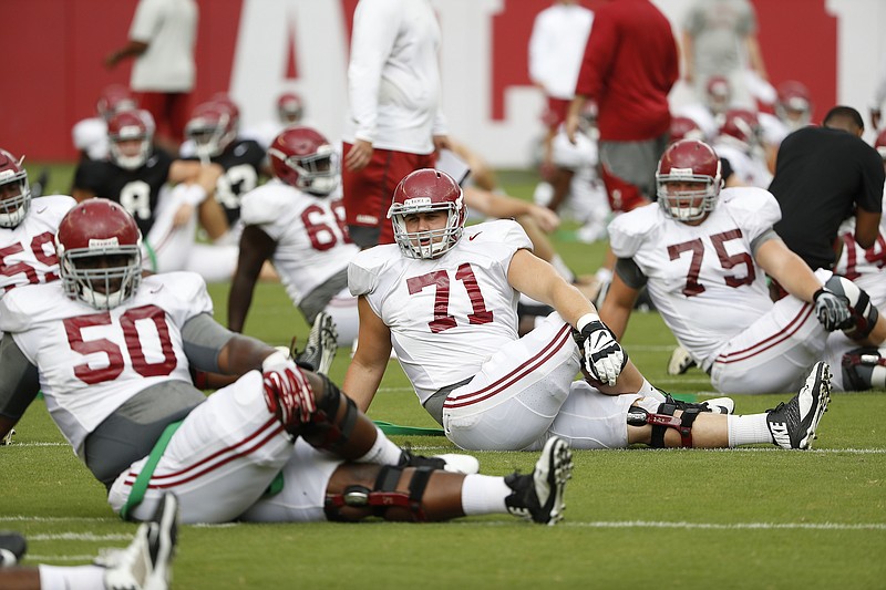 Ross Pierschbacher (71) is taking over as Alabama's center this year after making 15 starts last season at left guard.