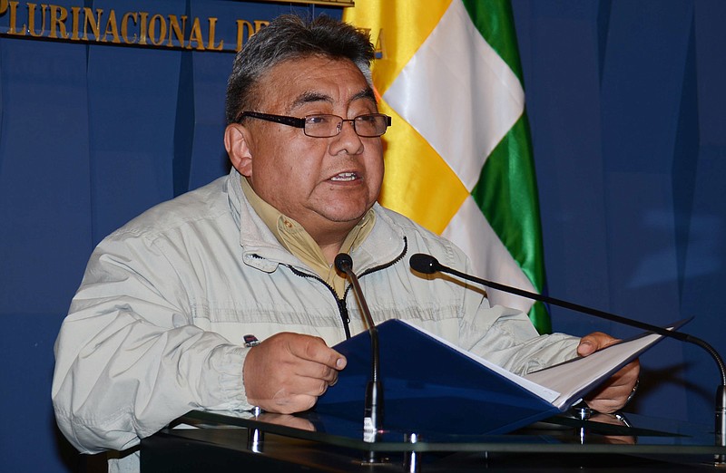 
              In this Nov. 26, 2014 photo, released by the government-run Bolivian Information Agency, Bolivia's Deputy Minister of Internal Affairs Rodolfo Illanes speaks during a press conference at the government palace in La Paz, Bolivia. Government officials said that the striking miners kidnapped and beat Illanes to death after he traveled to the area to mediate in the bitter conflict over mining laws. Government Minister Carlos Romero called it a "cowardly and brutal killing" and asked that the miners turn over the body of his deputy. (Gonzalo Jallasi/Bolivian Information Agency via AP)
            