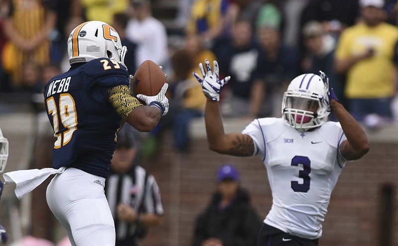 UTC's Lucas Webb intercepts a pass intended for Furman's Andrej Suttles during a game at Finley Stadium last October.