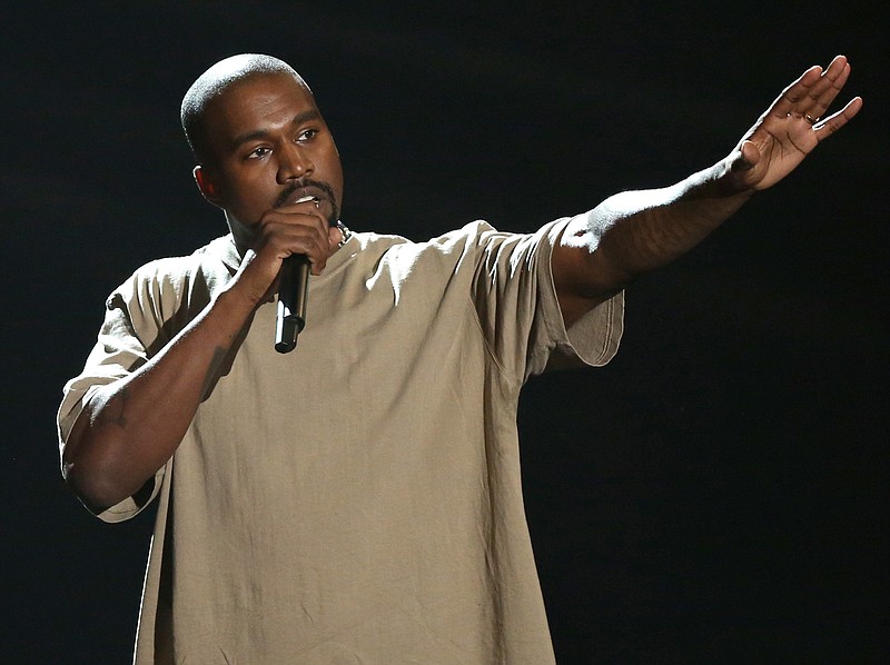 
              FILE - In this Sunday, Aug. 30, 2015, file photo, Kanye West accepts the video vanguard award at the MTV Video Music Awards at the Microsoft Theater in Los Angeles. What will be the spectacle at the MTV Video Music Awards this year? A long rant from West? A surprise appearance from Beyoncé? It’s all possible, and likely. The show is returning to New York City Sunday, AUG. 28, 2016. (Photo by Matt Sayles/Invision/AP, File)
            