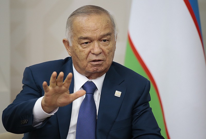 
              FILE In this file photo taken on Friday, July 10, 2015, Uzbekistan's President Islam Karimov gestures while speaking to Russian President Vladimir Putin during the SCO (Shanghai Cooperation Organization) summit in Ufa, Russia. Uzbekistan's government has issued, Sunday, Aug. 28, 2016, an unusual statement announcing the hospitalization of President Islam Karimov, who has ruled the former Soviet republic in Central Asia for more than 25 years. (AP Photo/Ivan Sekretarev, file)
            