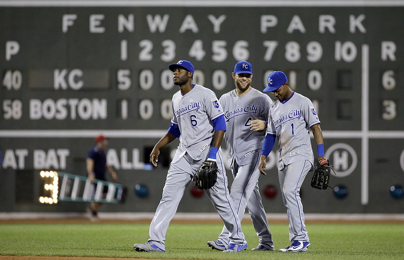 
              Kansas City Royals outfielders Lorenzo Cain (6), Alex Gordon (4) and Jarrod Dyson (1) walk to the dugout after they defeated the Boston Red Sox 6-3 in a baseball game at Fenway Park, Friday, Aug. 26, 2016, in Boston. (AP Photo/Elise Amendola)
            