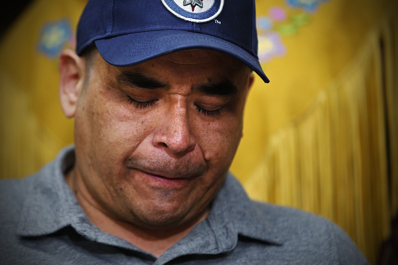 
              In this Friday, Aug. 26, 2016 photo, Norway House resident Leon Swanson weeps at a press conference in Winnipeg, Manitoba, Canada. Swanson and David Tait Jr. were switched at birth in 1975 when their mothers gave birth at Norway House Indian Hospital. A recent DNA test revealed that the two men from Norway House Cree Nation in northern Manitoba were likely raised by each other's families. The government believes it's the second case of being switched at birth to occur at the hospital.  (John Woods/The Canadian Press via AP)
            